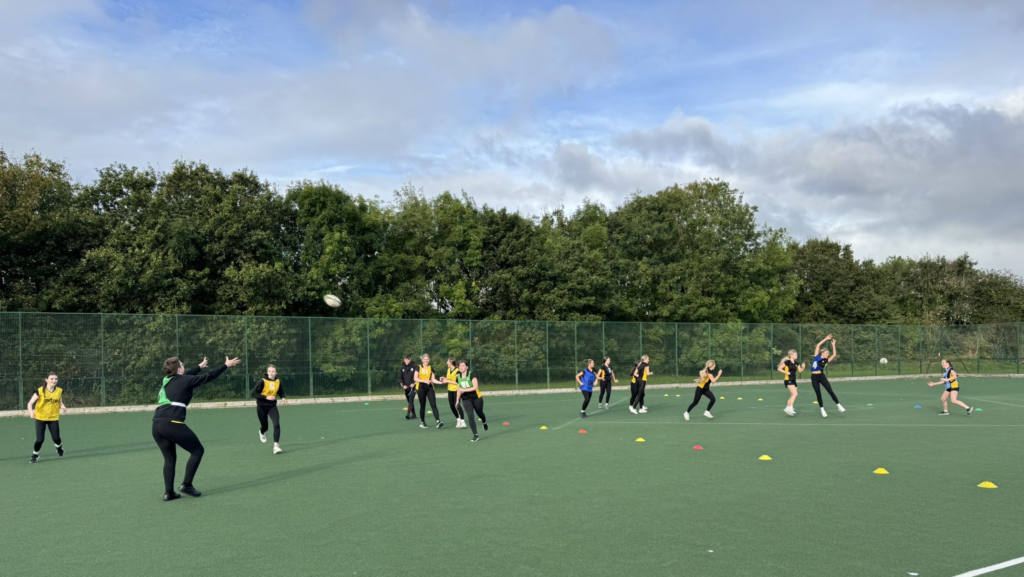 A photo of our Year 13 girls rugby team practise circa October 2024