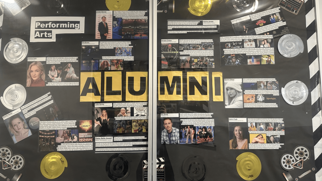 A photograph of our Performing Arts Alumni display board.