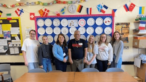 A photo of students and staff with Nicaragua. Sebastián Mendieta, who represents the Nicaraguan teaching union ANDEN circa October 2024