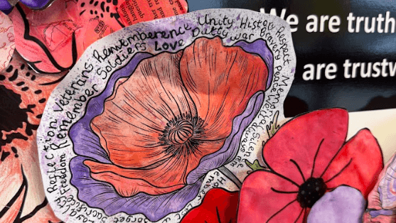 A photo of art work created by Lower School Students reflecting on Remembrance Day, circa November 2024.