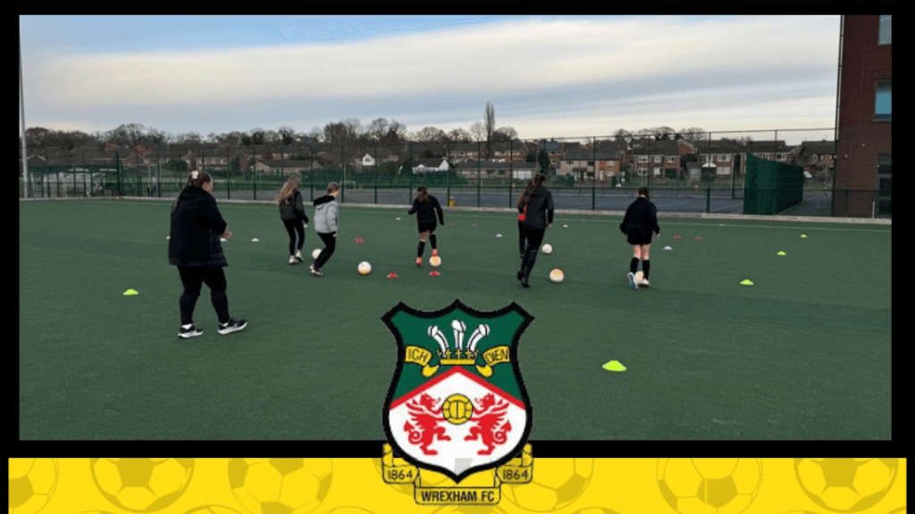 A photograph of our Year 8 football team training with Wrexham FC Community Trust coaches, circa November 2024