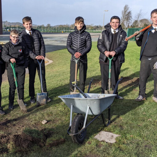 Social media image of Year 10 students planting new fruit trees on campus (27/01/25)