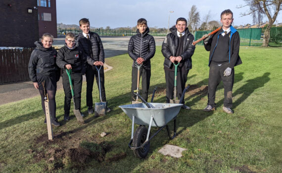 Social media image of Year 10 students planting new fruit trees on campus (27/01/25)