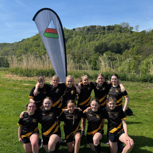 A photograph of our Year 8 and 9 girls rugby team who progressed to the semi-finals of the Plate competition, circa May 2025