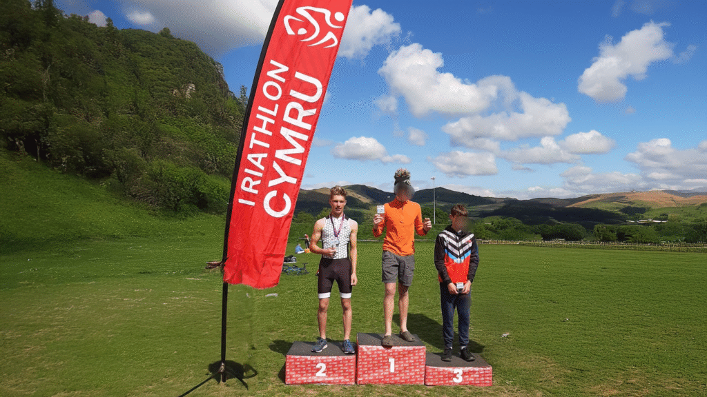 A photograph of Year 11 student, Zak, who recently took 2nd place at the first Welsh triathlon of the season, circa May 2025