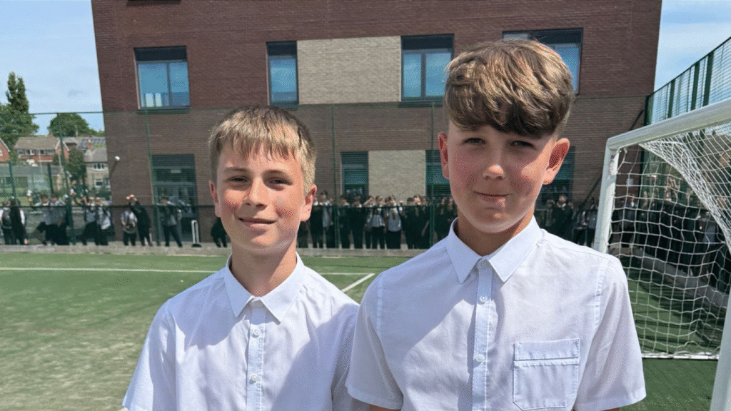 A photograph of two students who were the LTA Road to Wimbledon boys' winner and runner up respectively, circa June 2025