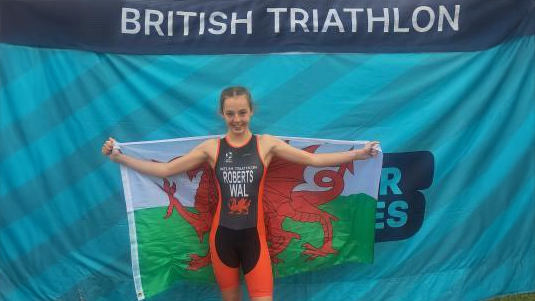A photograph of a Year 9 student who represented Wales in a British Tri event, circa September 2025