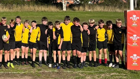 A photograph of the Year 8 rugby team after a victory against Caldy Grammar, circa 2025