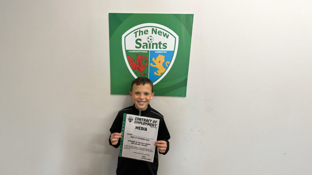 A photograph of Joshua at the New Saints FC (TNS) Junior Members Takeover Day, circa October 2025
