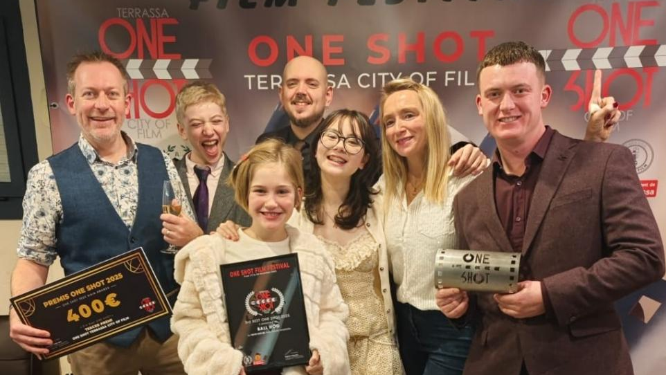 A photograph of students at the International One Shot Film Festival in Barcelona, circa December 2025