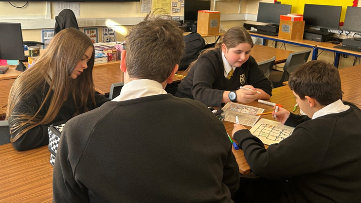 A photograph of students taking part in the GCHQ Christmas Challenge, circa December 2025