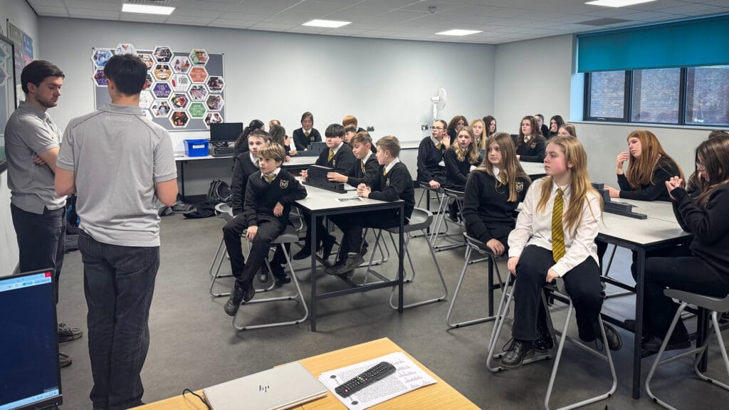 Students attending a classroom talk with visiting speakers about careers and opportunities, circa January 2026