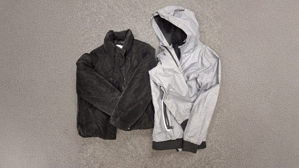Two unclaimed coats laid out as part of the school’s lost property system, circa February 2026