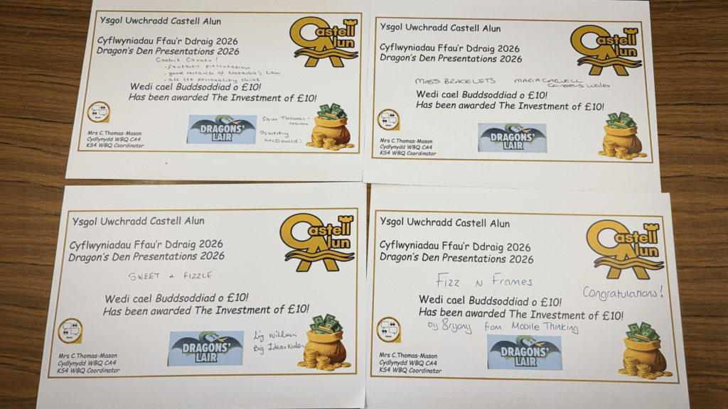 Four certificates from Ysgol Uwchradd Castell Alun for ‘Dragon’s Den Presentations 2026,’ each awarding an investment of £10, laid out on a wooden surface.